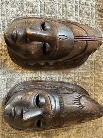 Male and Female Wooden masks